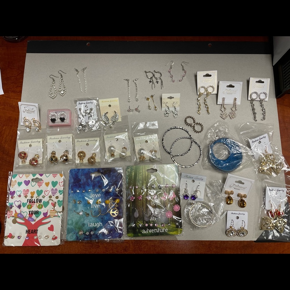 (Sold) 68 pairs of earrings most of them new